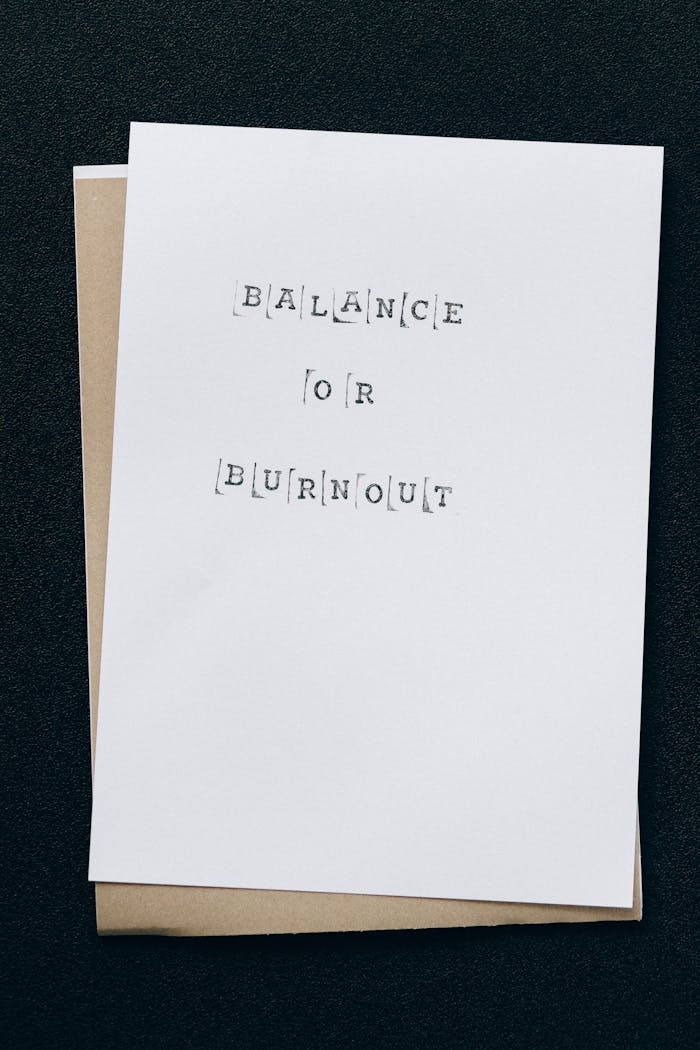 services-01 A simple card displaying the message 'Balance or Burnout' emphasizing mental health and stress management.