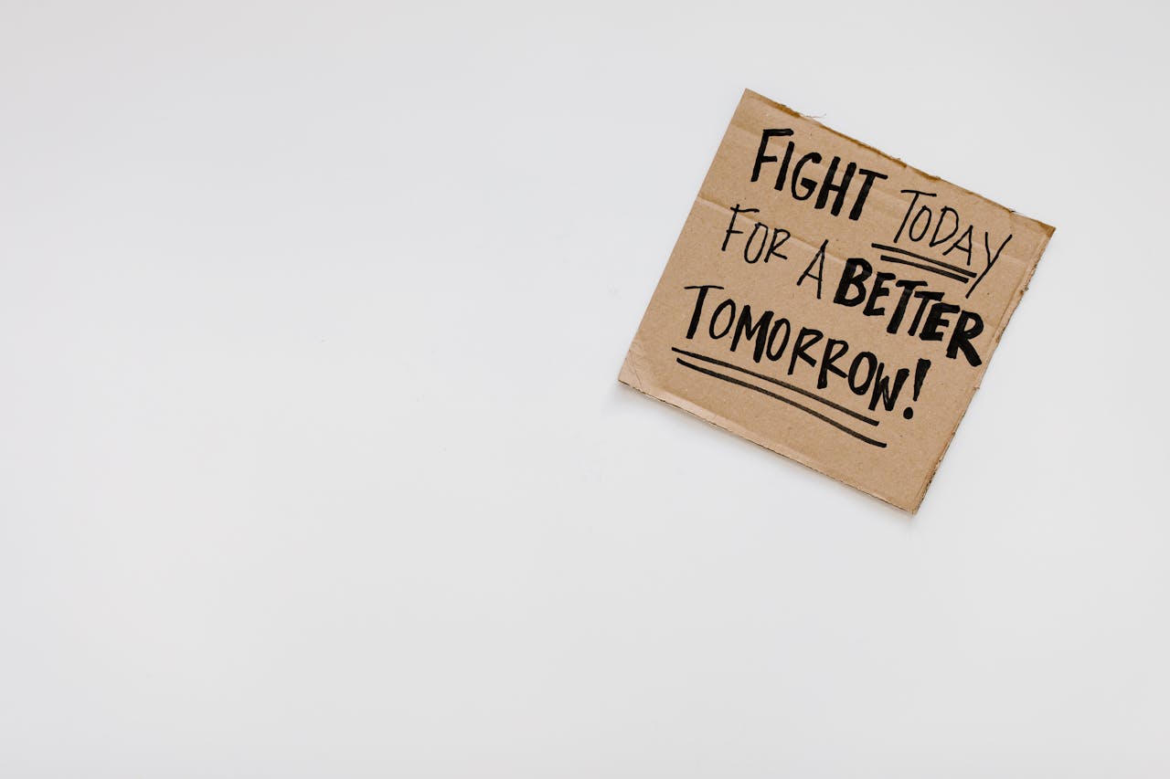 services-02 Handwritten motivational message on cardboard for a better future.